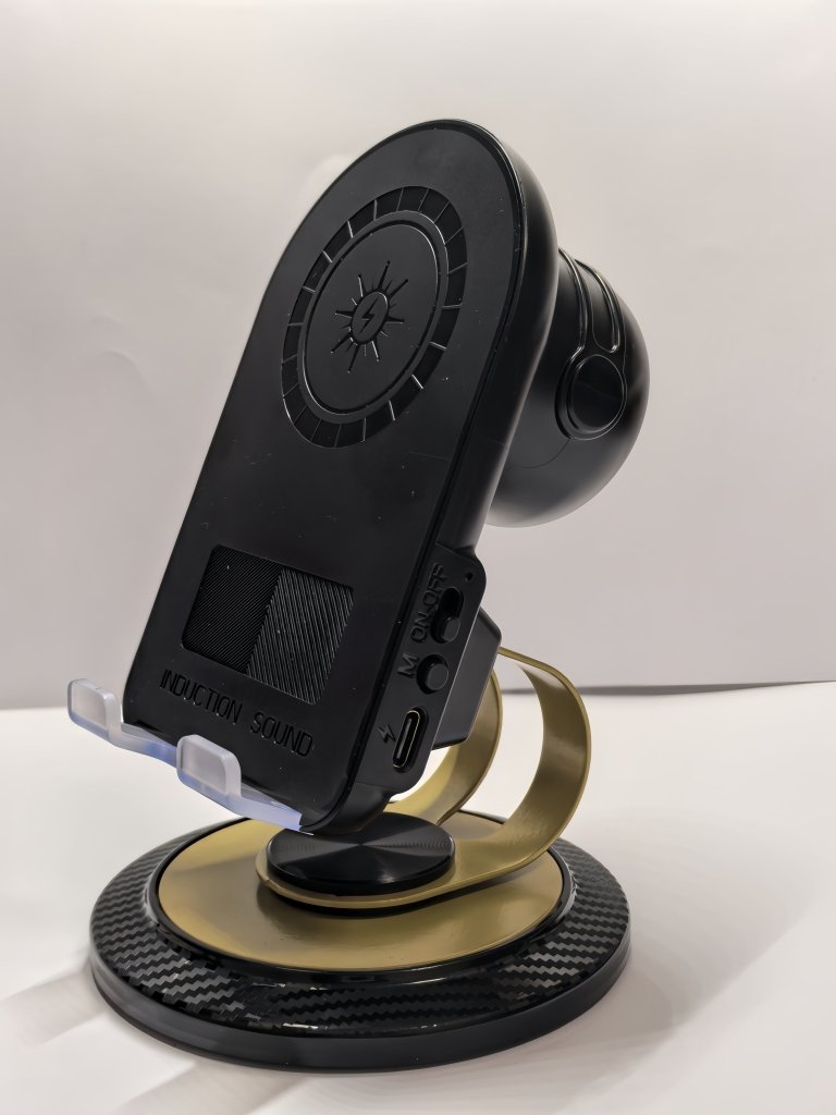 Phone holder with wireless speaker