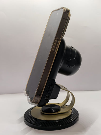 Phone holder with wireless speaker