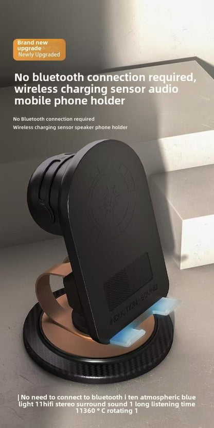 Phone holder with wireless speaker